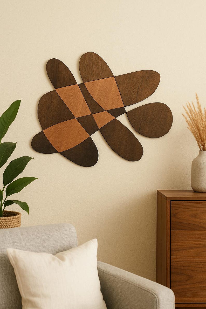 Finished piece hung on a living room wall above a sideboard